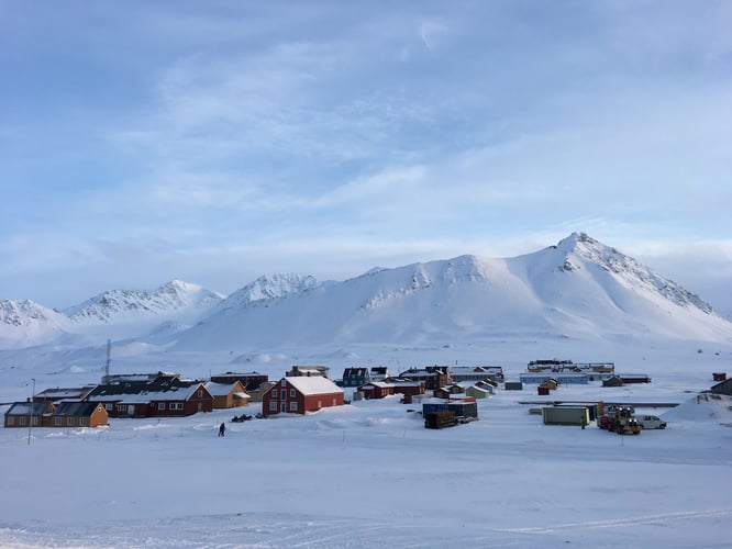 Snowcovered winter landscape showing the research settlement Ny-Ålesund in Svalbard