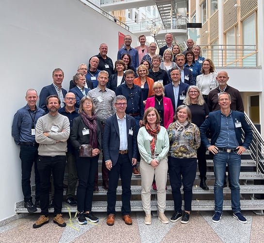 Bildet viser et gruppebilde av ansatte i Norsk Polarinstitutt og Forskningsrådet under en samling i Forskngsrådet lokaler